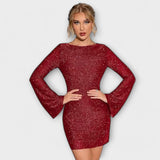 Šaty bez chrbta s trblietkami a dlhými rukávmi