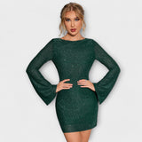 Šaty bez chrbta s trblietkami a dlhými rukávmi